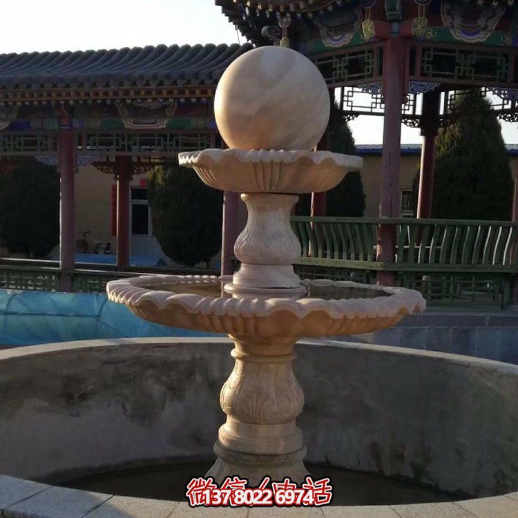 中式庭院水池擺放晚霞紅雕刻二層風(fēng)水球